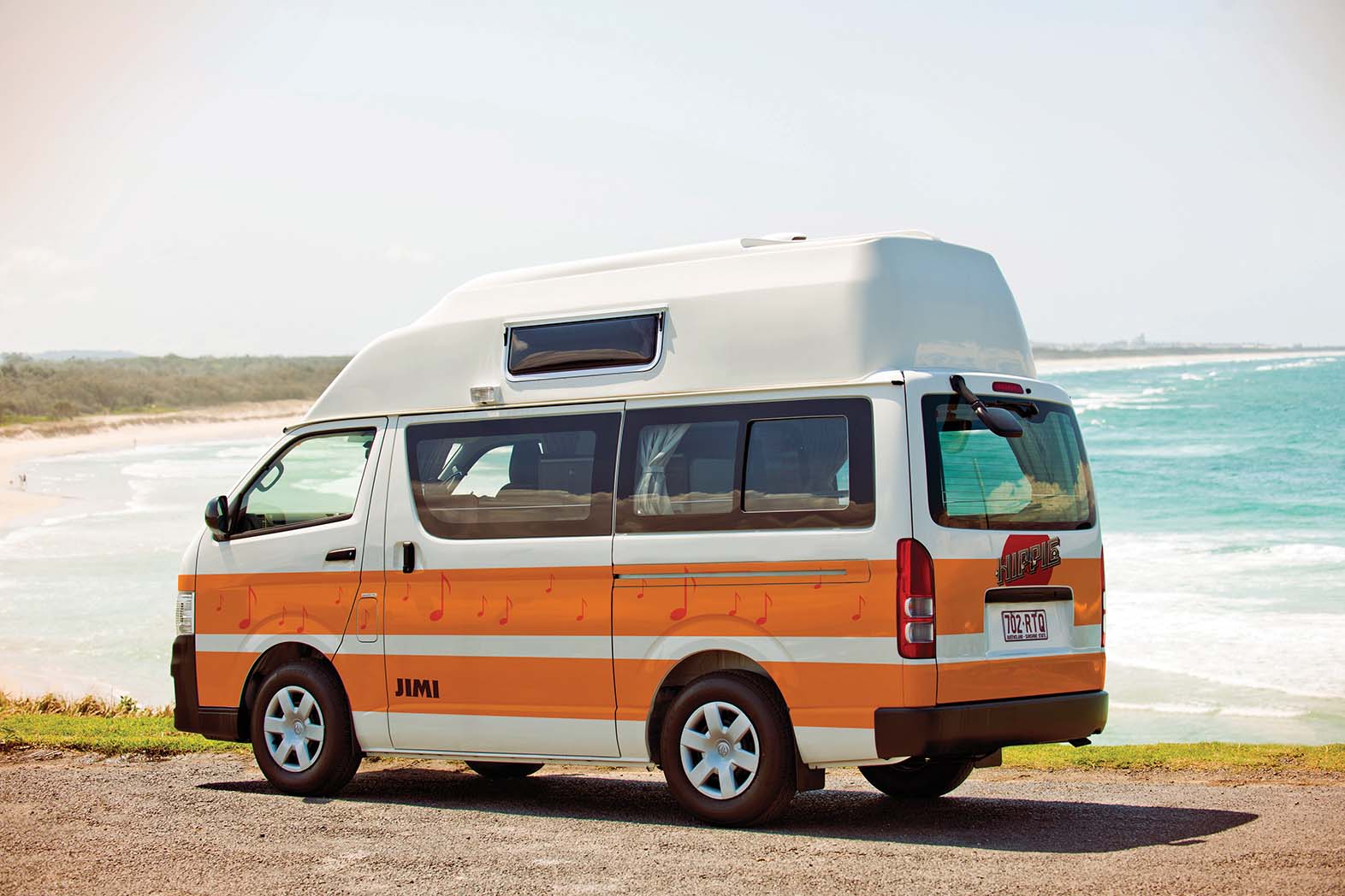 Hippie Campervan overlooks New Zealand beach